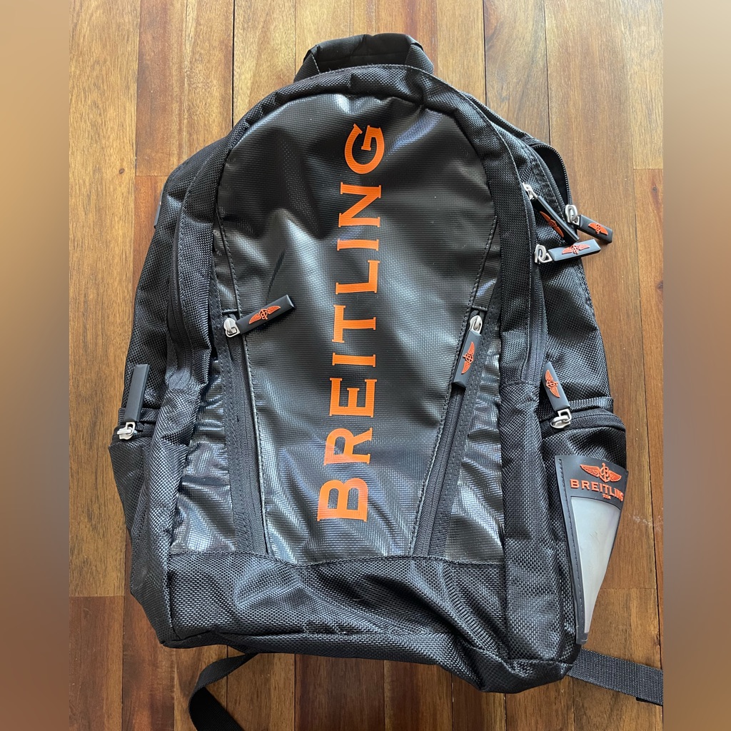 Breitling Black And Orange Backpack